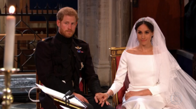 Príncipe Harry e a atriz Meghan Markle durante o casamento
(Foto: Reprodução/Globo)