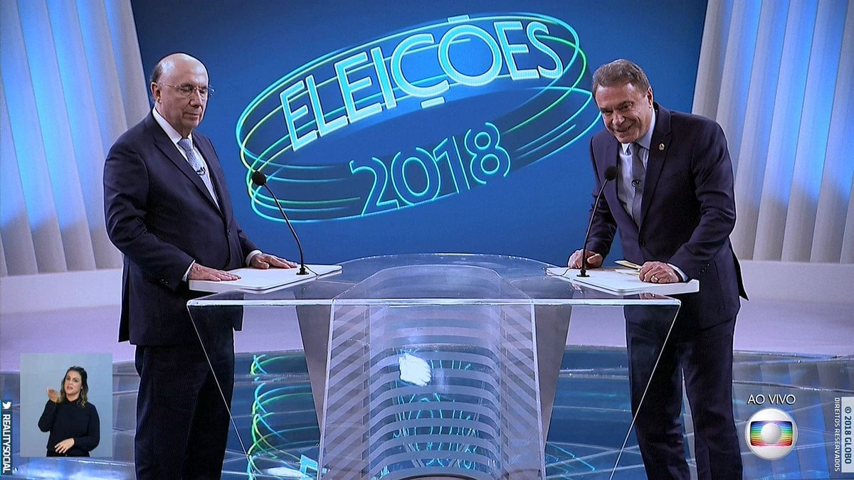 Henrique Meirelles e Álvaro Dias no centro do debate na Globo (Foto: Reprodução/Globo)