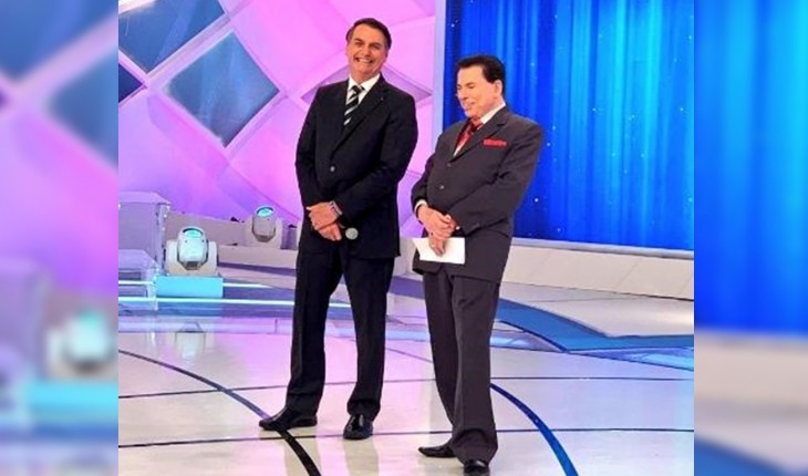 Silvio Santos e Jair Bolsonaro no palco do SBT (Foto UOL)