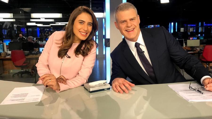 Lana Canepa e Eduardo Oinegue na bancada do Jornal da Band (Foto: Divulgação/Band)