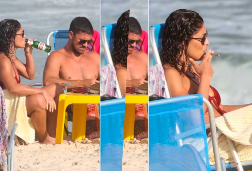 Juliana Paes flagrada fumando charuto na praia (Foto reprodução)