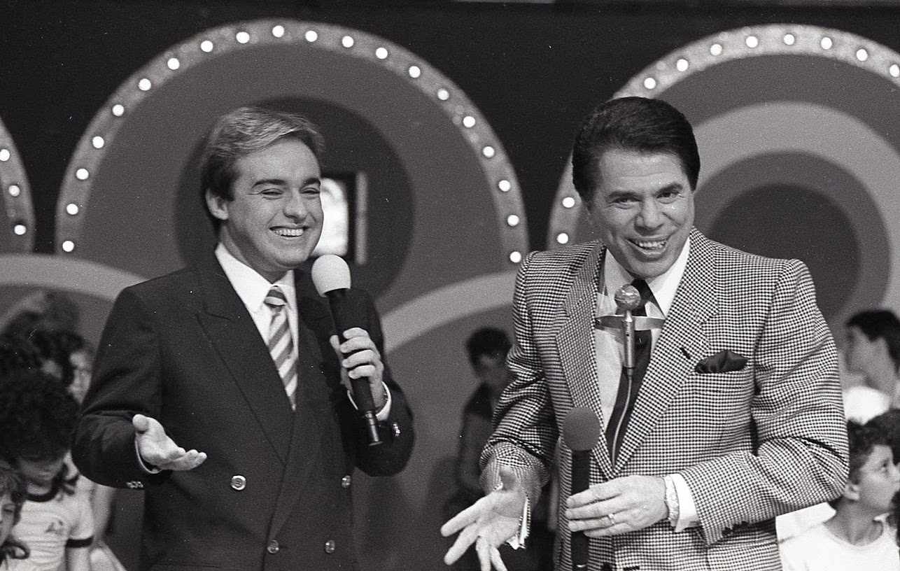 Gugu no SBT ao lado de Silvio Santos. Foto: Reprodução