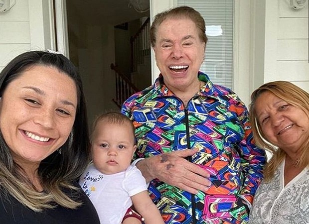 Silvio Santos tirou foto com brasileiros em Orlando (Foto: Reprodução)