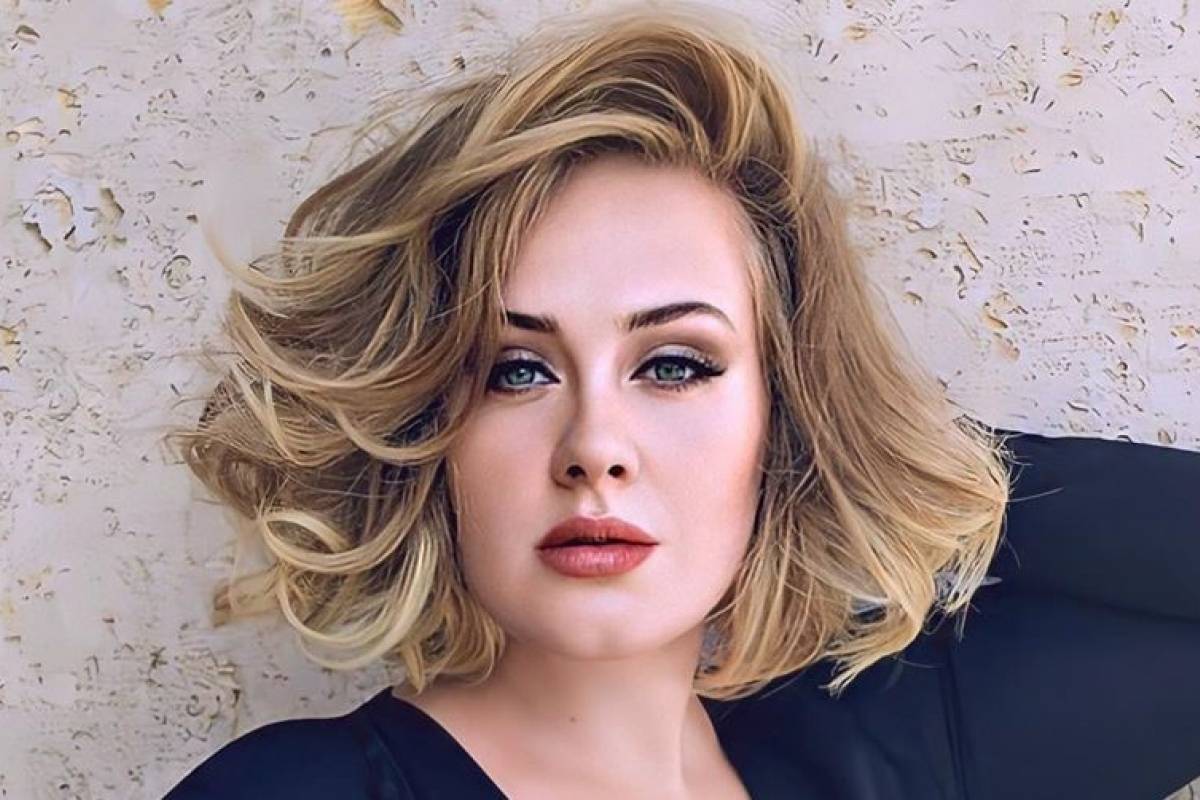 Relação entre Adele e rapper bonitão é apontada pela web (Foto: Reprodução)