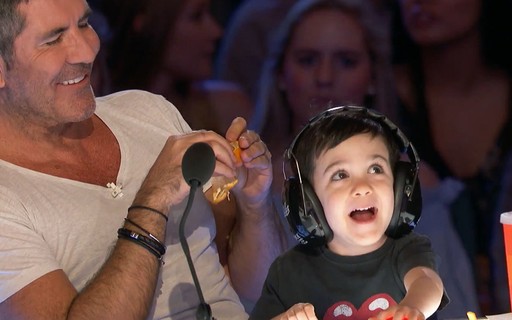 Simon Cowell e o filho Eric (Foto: Reprodução)