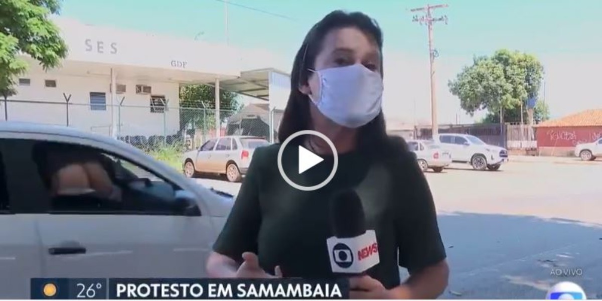 Camila Guimarães, repórter do "DFTV1", foi surpreendida com homem nu (Foto: Reprodução/TV Globo)