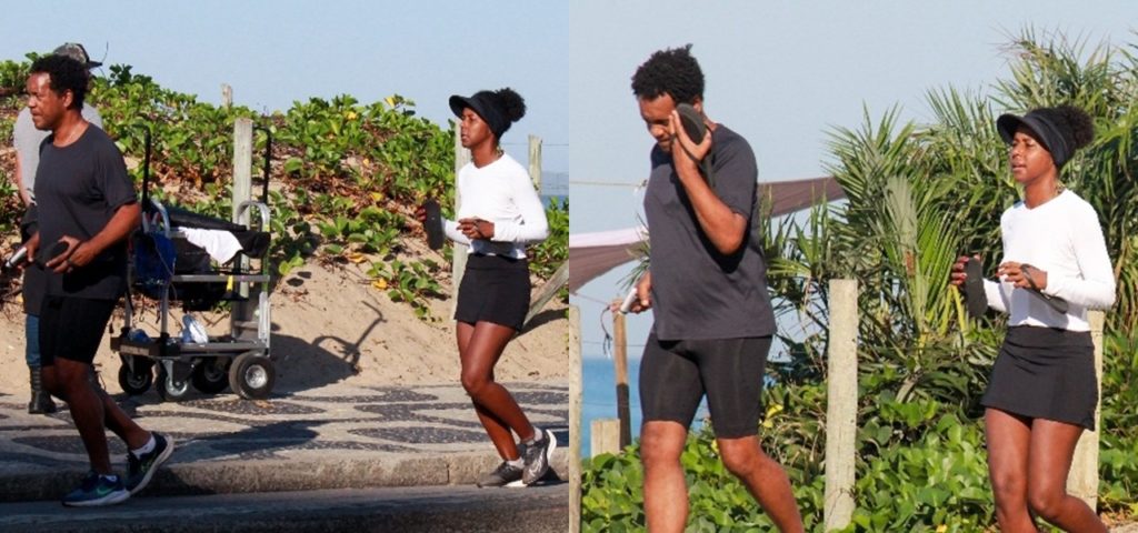 Maju foi fotografada correndo com o marido em uma praia no Rio de Janeiro