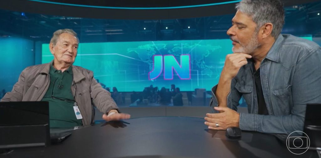 Léo Batista e William Bonner na bancada do Jornal Nacional- Foto: Reprodução/Globo