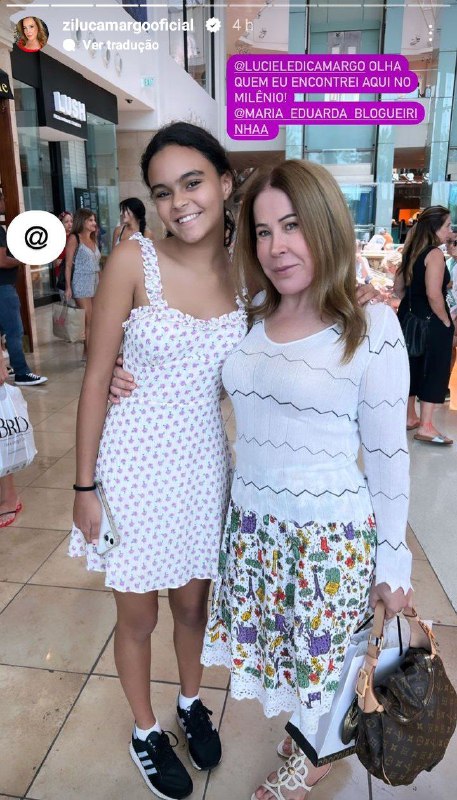 Zilu Godói surgiu agarrada com a filha de Luciele e Denílson (Foto: Reprodução)