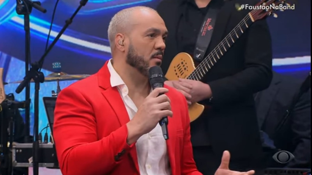 Belo foi convidado do Faustão na Band, mesma emissora que Denílson trabalha, com quem acumula divida alta 