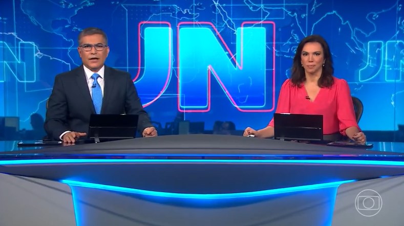 Hélter Duarte e Ana Paula Araújo comandaram o Jornal Nacional (Foto: Reprodução)