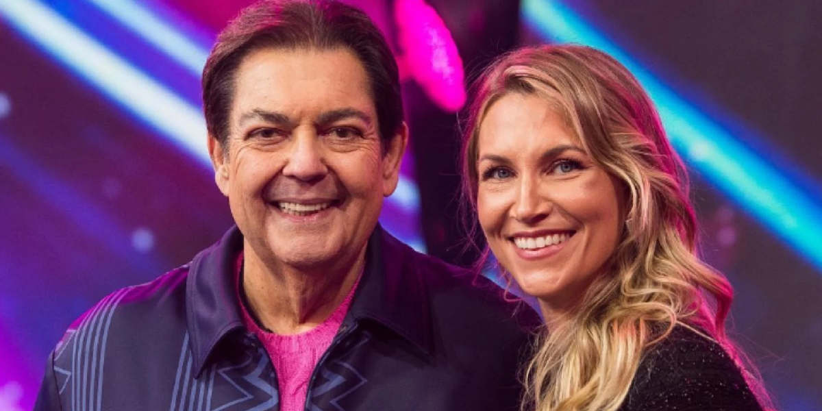 Faustão e Anne Lottermann, sua atual assistente de palco (Foto: Divulgação / Band)