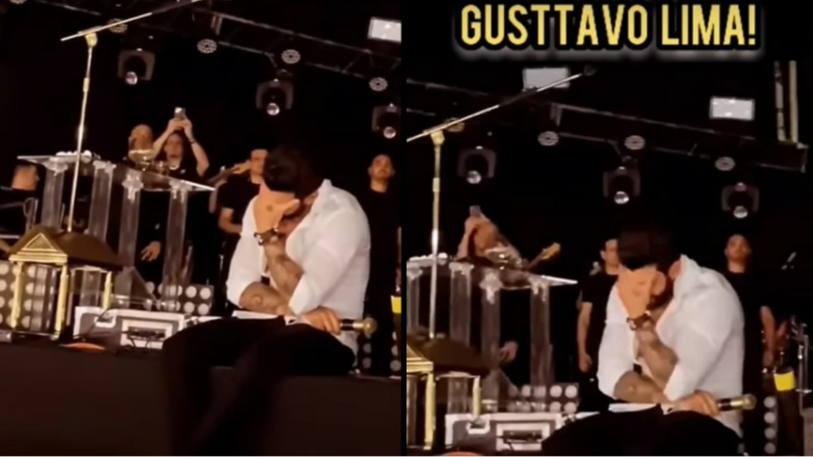 Momento que multidão grita música e Gusttavo LIma, sentado no chão do palco, leva as mãos ao rosto e chora 