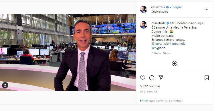 O âncora do Jornal Hoje, da Globo, César Trallli senta no meio da redação da atração jornalistica e confirma situação  - Foto Reprodução