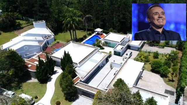 O eterno apresentador do SBT, Gugu Liberato, deixou uma mansão luxuosa que conta com piscina enorme, quadra e sala de troféus e está assim hoje - Foto Reprodução de Vídeo