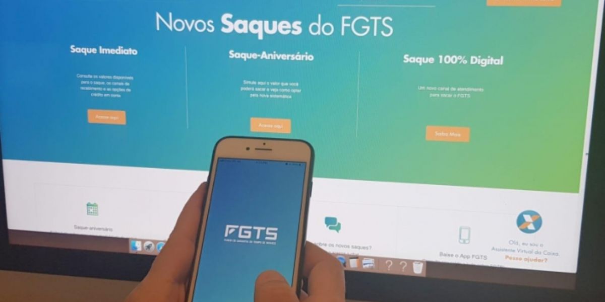 Aplicativo do FGTS em celular e site aberto em computador - Foto Reprodução Internet