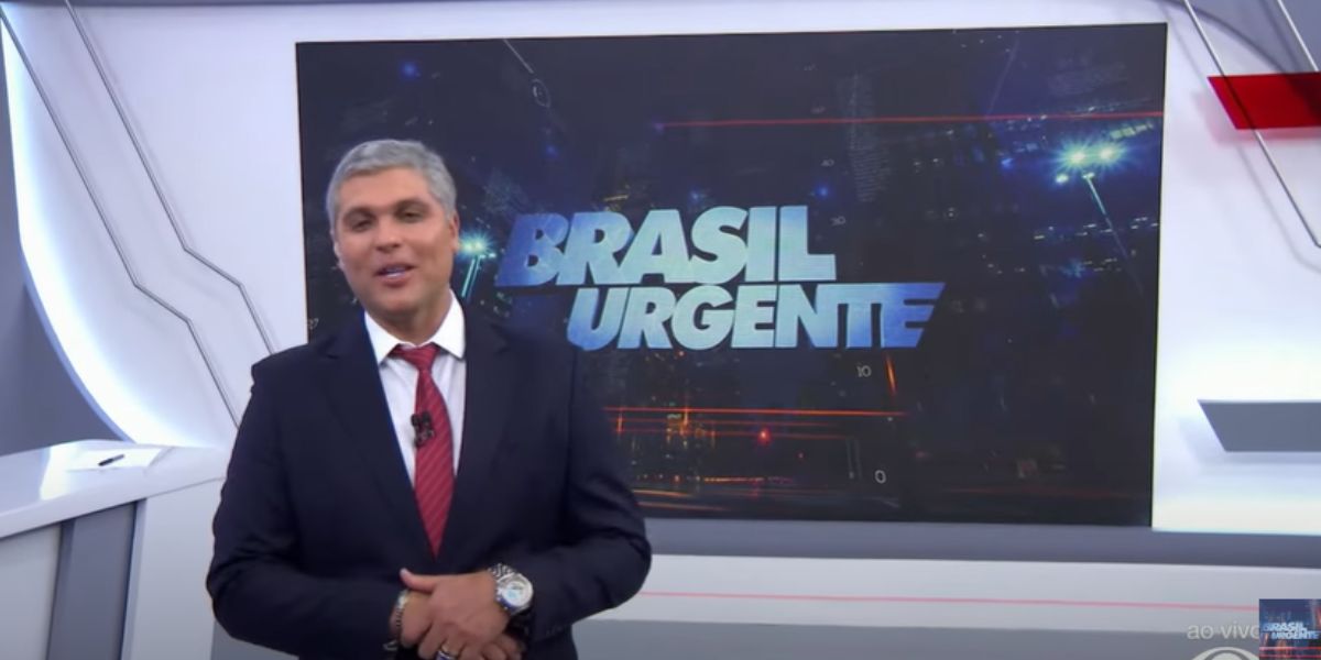 O jornalista está substituindo o próprio pai, que está de férias, no Brasil Urgente (Reprodução: Band)