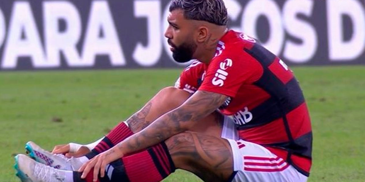 Gabigol sentindo a lesão – (Reprodução / Premiere / Tv Globo)