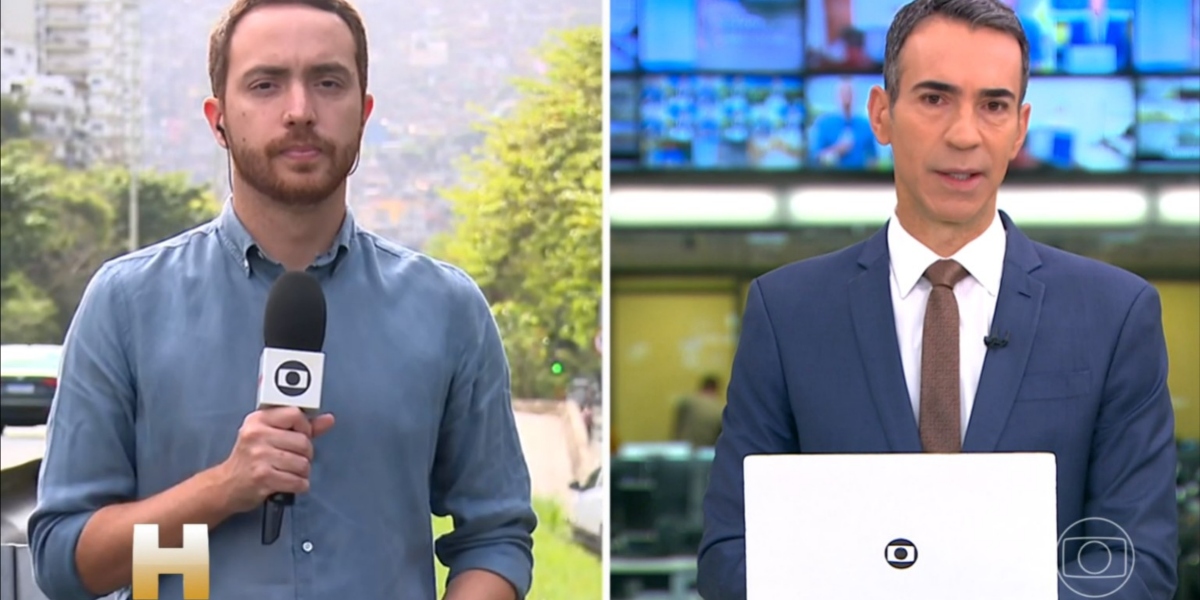 Repórter André Coelho durante entrada ao vivo com Cesar Tralli (Foto: Reprodução/TV Globo)