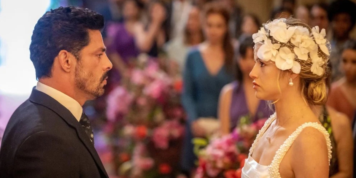 Caio (Cauã Reymond) e Graça (Agatha Moreira) em cena de casamento em "Terra e Paixão" (Foto: Paulo Belote/TV Globo)