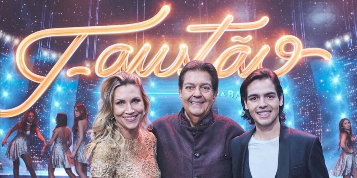 Anne Lottermann, Faustão e João Guilherme nos estúdios da Band (Reprodução: Band)