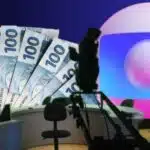 Globo expõe vitória com pagamento do salário mínimo em meio a jornal (Foto Reprodução/Montagem/Lennita/Tv Foco)