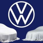 Logo da Volkswagen e carros cobertos - Foto Reprodução Internet